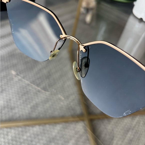 Prada Black Cat-Eye Glasses with Rimless Design - Picture 10 of 14